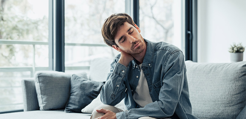 man with neck pain